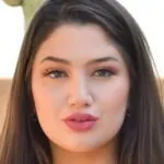 Alyx Star - American 34F enhanced big tits model profile photo