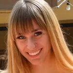 Angel Youngs - American 32DD enhanced big tits model profile photo