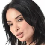 Anissa Kate - French 34DD enhanced big tits model profile photo