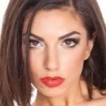 Darcie Dolce - American 32DD natural big tits model profile photo