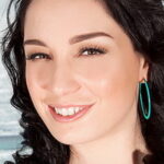 Michelle Bond - British 36K natural big tits model profile photo